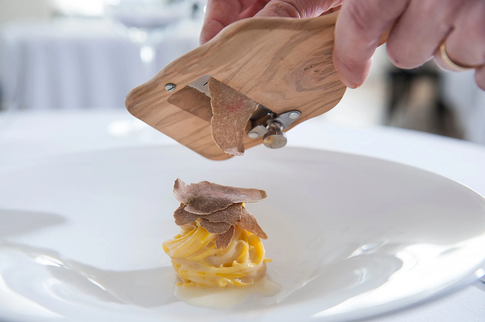 Fresh tajarin finished tableside with shavings of Alba white truffle